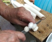 Preparing banana stems for making the soup 