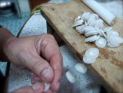 Preparing banana stems for making the soup 